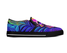 2. Black Side View: Neon Jungle Skull Slip-Ons in black showing side profile with vibrant skull and jungle leaf design
