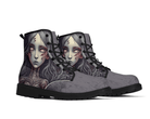 2. Angle View: Phantom Child Classic Boots at 45-degree angle showcasing gothic black and gray tones with red accents
